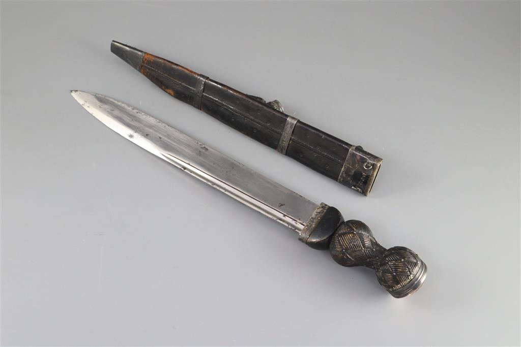 A William IV Scottish silver mounted black leather dirk, blade 32.5in. overall length 47.5in.